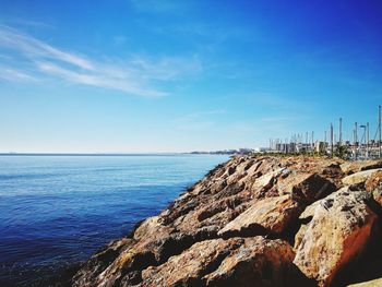 Scenic view of sea against blue sky