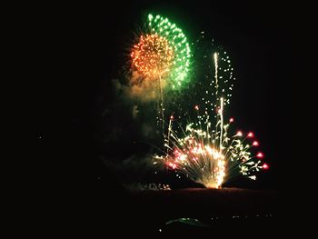 Low angle view of firework display