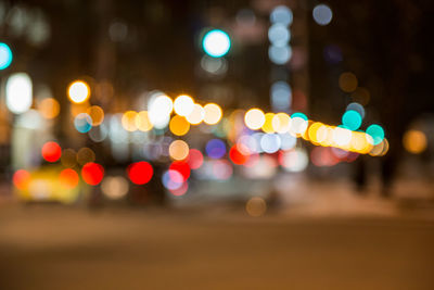 Defocused lights on road at night