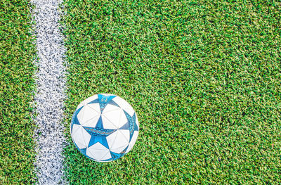 High angle view of soccer ball on field