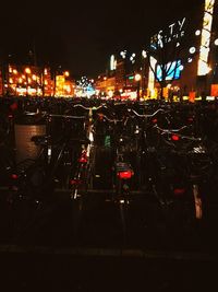 Cars on road in city at night