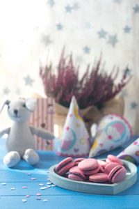 Close-up of pink flowers on table