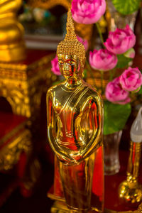 Close-up of buddha statue in temple