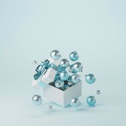 High angle view of coins on white background