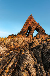 Low angle view of blackchurch rock 