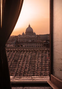 View of historic building against sky during sunset