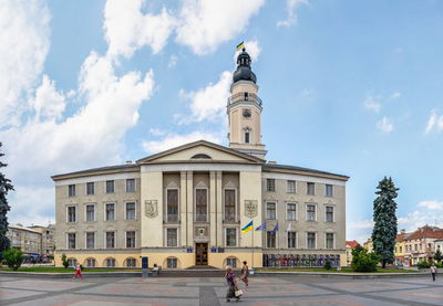 Town hall on the market square in drohobych, ukraine, on a summer day