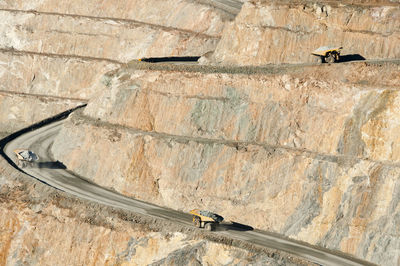 Low angle view of rock formation on wall