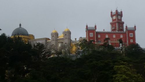 View of temple with buildings in background