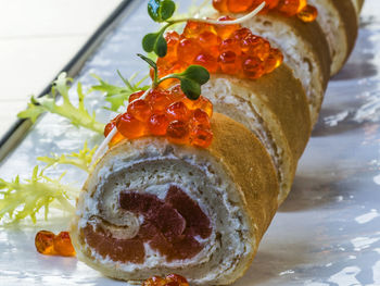Close-up of sushi served on table