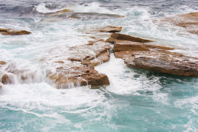 Scenic view of rocks in sea