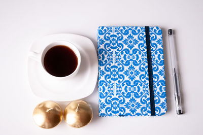 Directly above shot of coffee cup on table