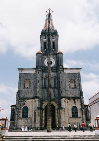 View of historic building against sky in city