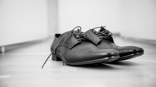 Close-up of shoes on table