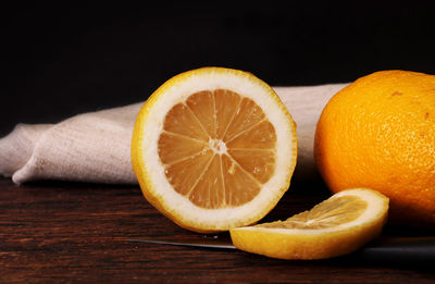 Close-up of oranges against black background