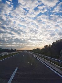 Road against sky during sunset