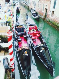 Boats moored in canal