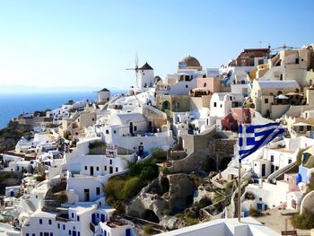 View of townscape against blue sky