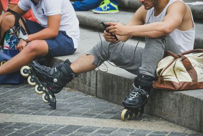 Low section roller skater using smart phone