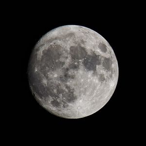 Low angle view of moon against clear sky at night