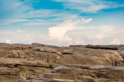 Panoramic view of rock formations against sky