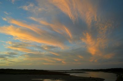 Scenic view of sea at sunset