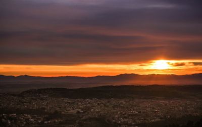 Scenic view of silhouette landscape against sky during sunset