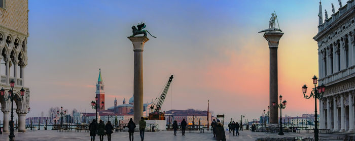 Panoramic view of buildings against sky during sunset