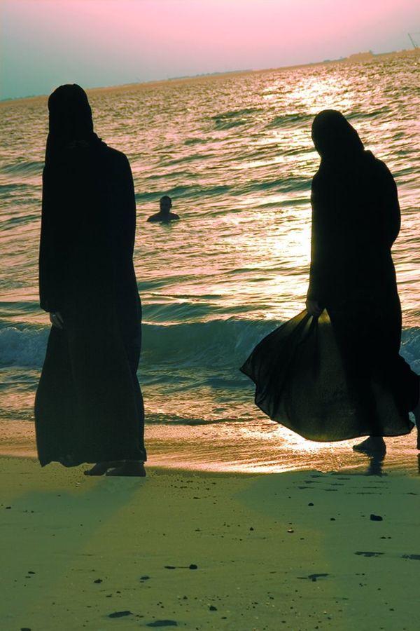 2 Women at Jumeirah Beach Dubai UAE Abaya Beach Hijab Jumeirah Middle Eastern Woman Sea Women First Eyeem Photo