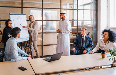 Business colleagues working in office