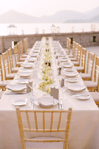 Table and chairs in a row