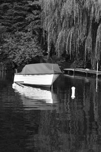 Boat moored in lake