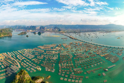 Aerial view of floating platform in sea against sky