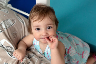 Portrait of cute baby at home