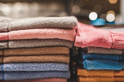 Stack of multi colored towels in store