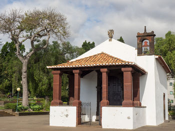 Built structure by building against sky