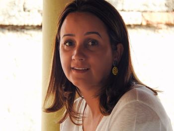 Close-up portrait of smiling young woman