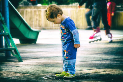 Boy playing with umbrella