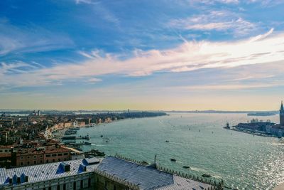 High angle view of buildings by sea against sky. venice italy