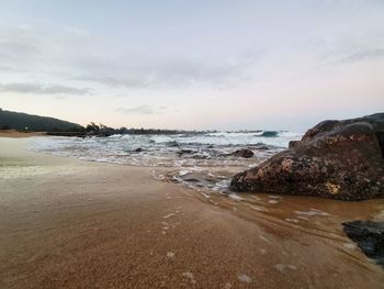 Scenic view of beach against sky