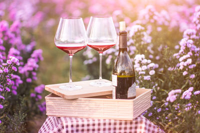 View of white and red wine in glass on table