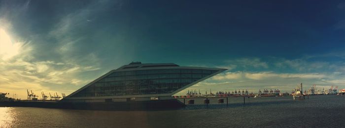 View of buildings against cloudy sky