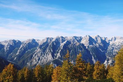 Scenic view of snowcapped mountains against sky