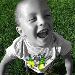 Portrait of boy on field