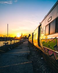 Train against sky during sunset