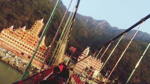 Panoramic view of trees and mountains against sky