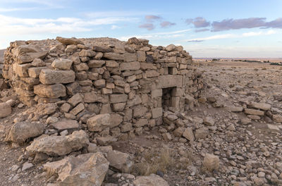 Stone wall against sky