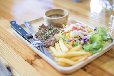 Close-up of meal served on table