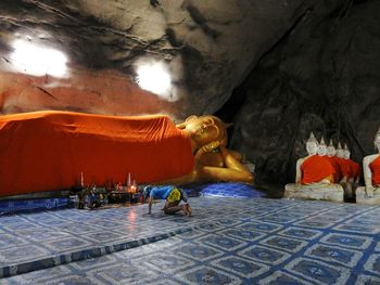 Statue in illuminated room