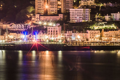 Illuminated cityscape at night
